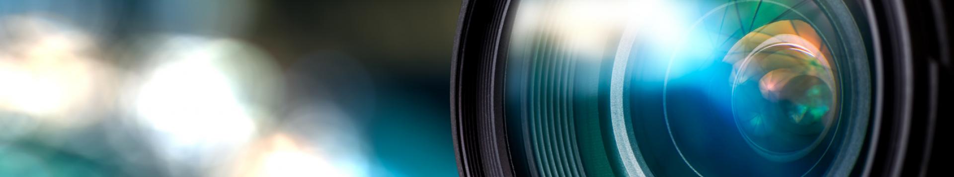 zoom on a camera lens - shutterstock