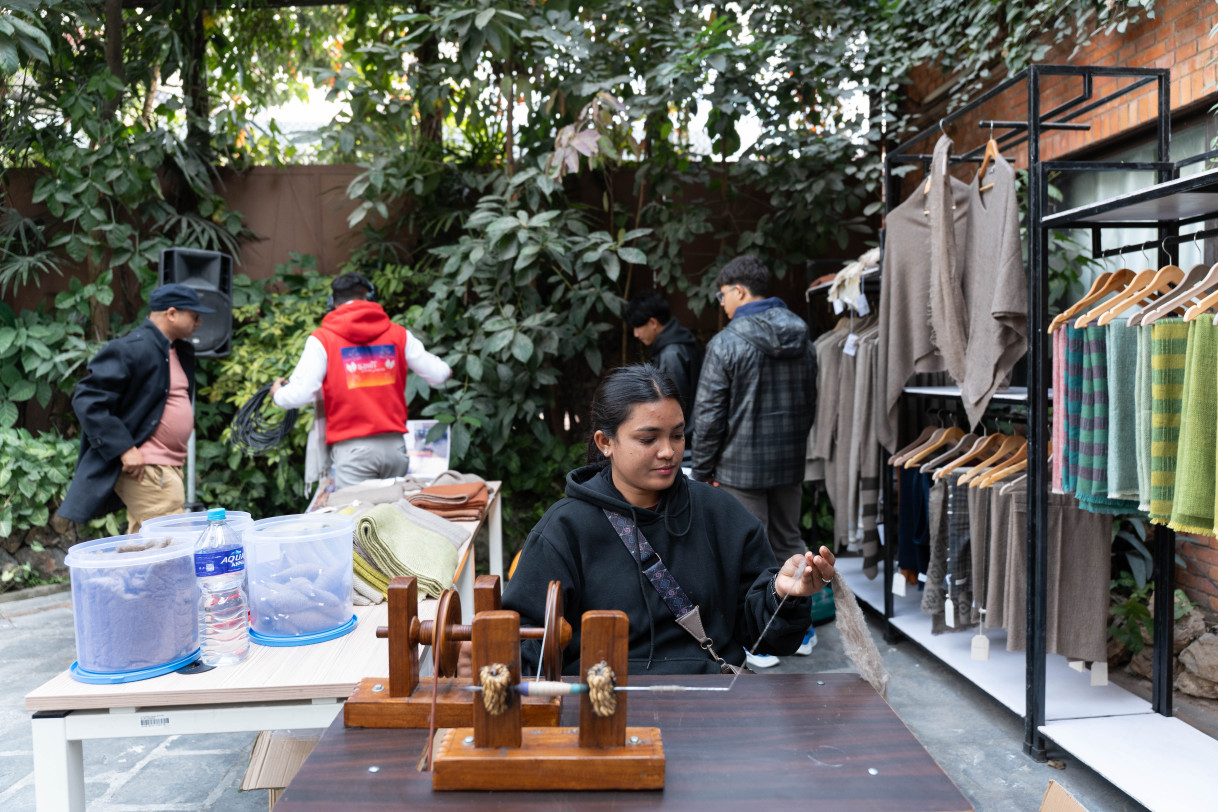 Pashmina artisan hand-spins pashmina fibre.