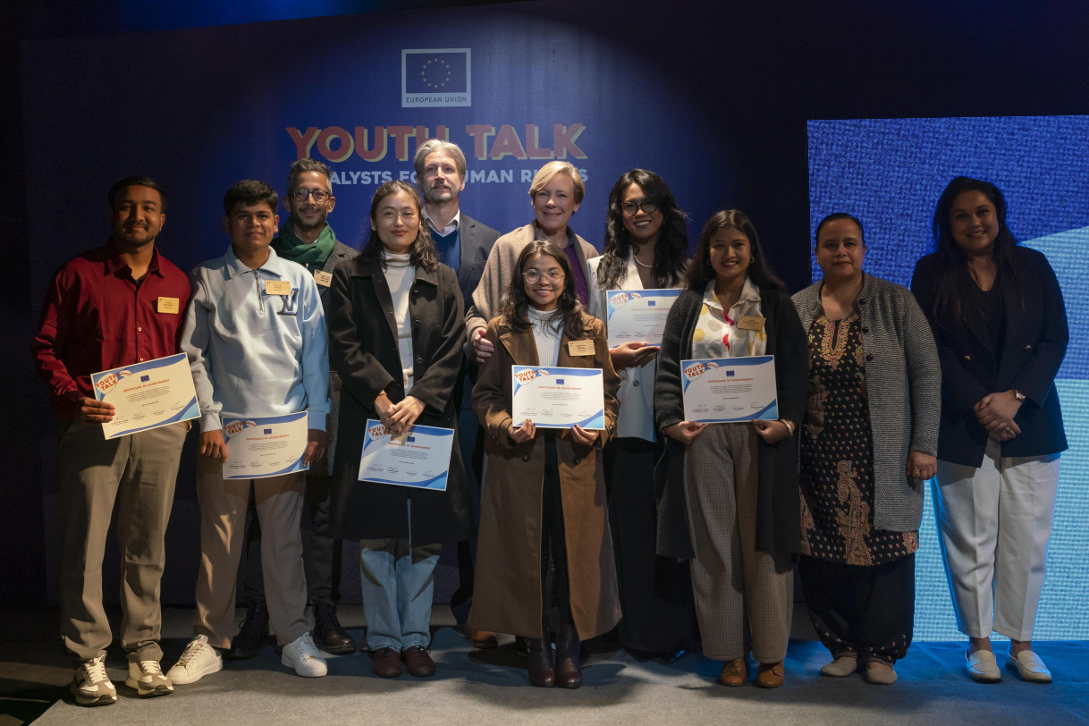 A group photo of speakers.