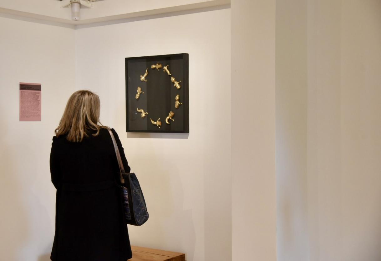 a woman taking a lot into art 