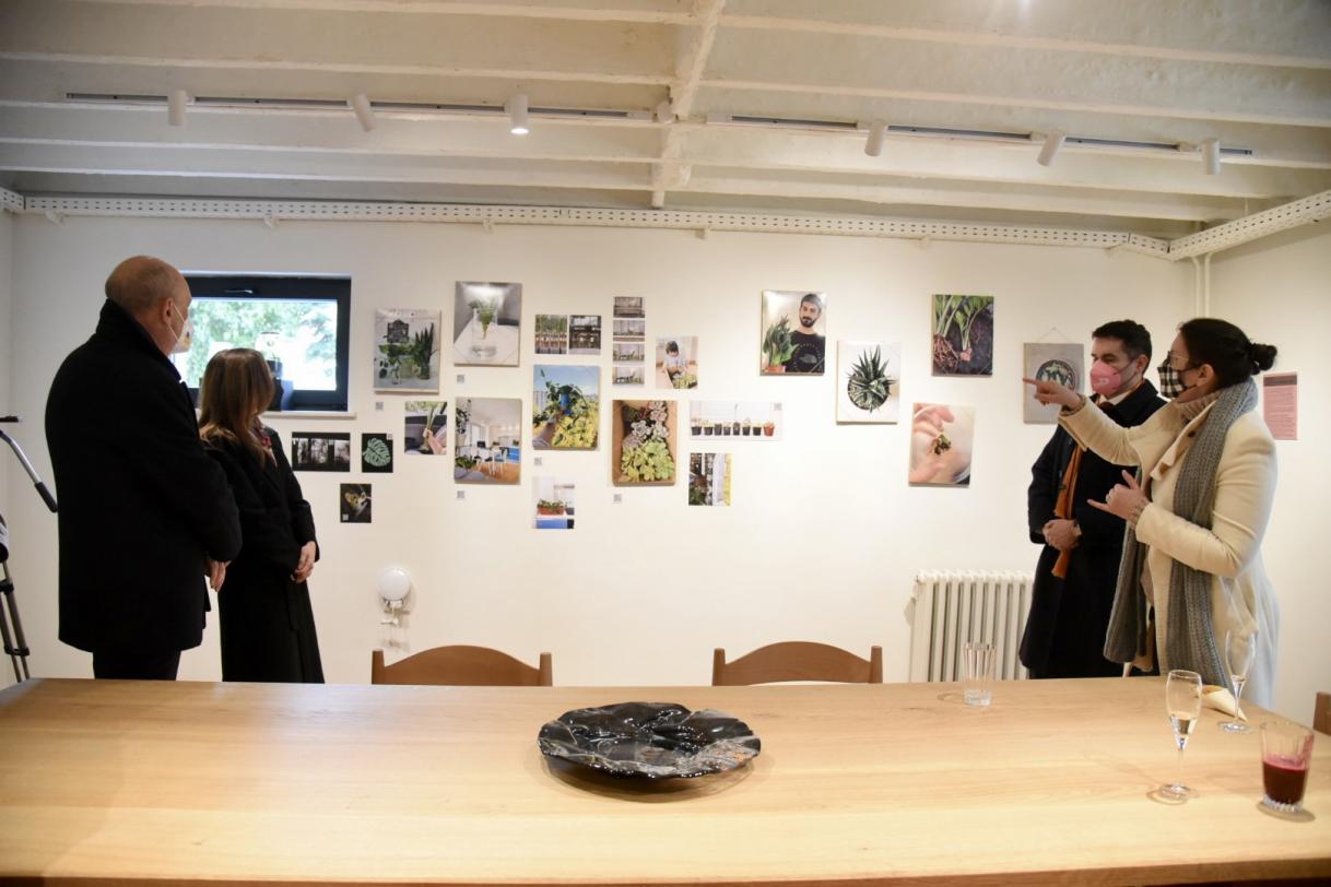 people watching an exposition