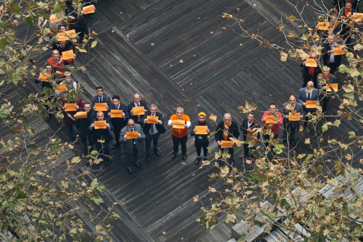 Men at EEAS form O for Zero Tolerance for violence agaisnt women at EEAS courtyard as part of the #16days of activism