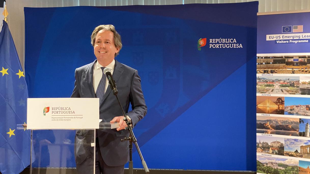 Man talking into a lectern
