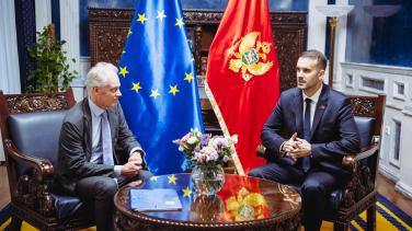Koopman sitting with Prime Minister Spajić