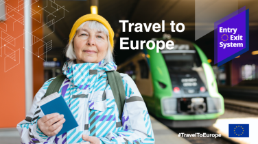 Travel To Europe: person in front of a train holding a passport