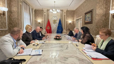 Officials sitting around a table