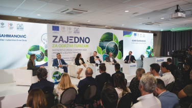 Panelists and audience sitting