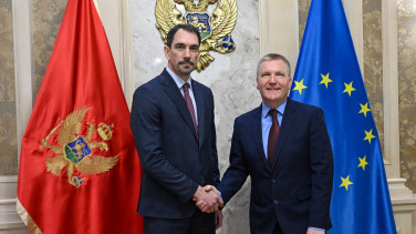 Commissioner Michael McGrath shaking hands with Supreme State Prosecutor Milorad Marković