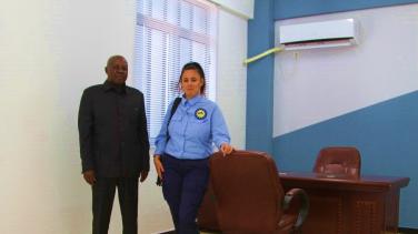Office with two people posing