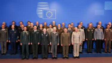 A group photo of 30 men in uniform, high ranking. 