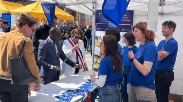 People visiting the stand