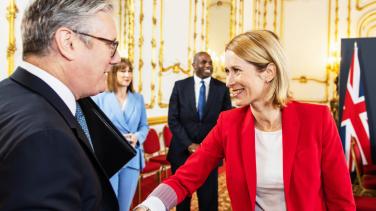 Foreground, Keir Starmer, UK PM, meets and greets HRVP Kaja Kallas, other dignitaries in background.