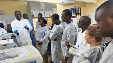 Scientists gather in a workshop for training in forensics.