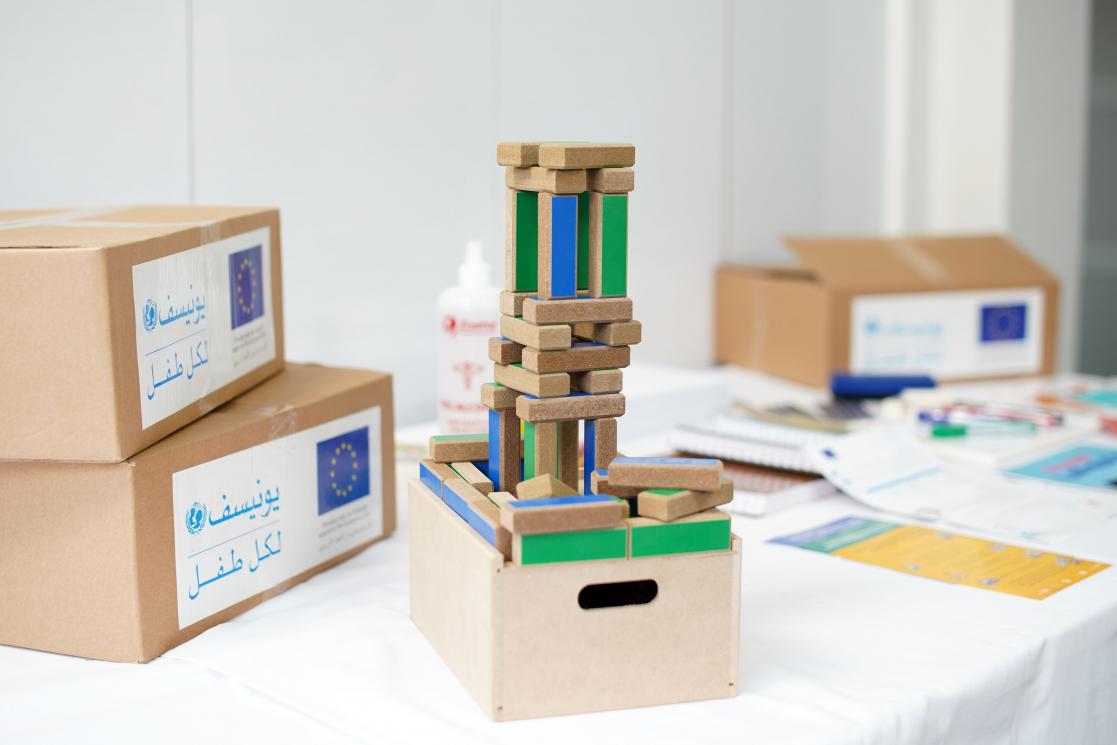 boxes and wood games in a table