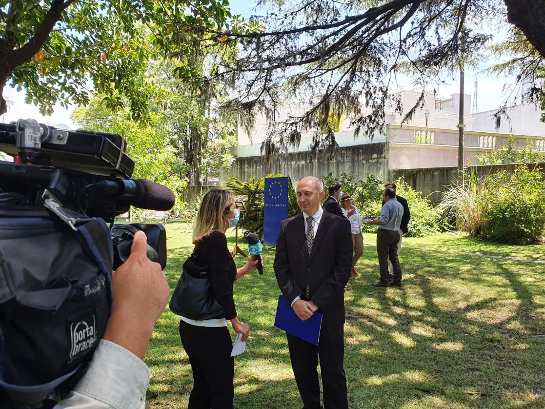 Interviewer and interviewee in a garden