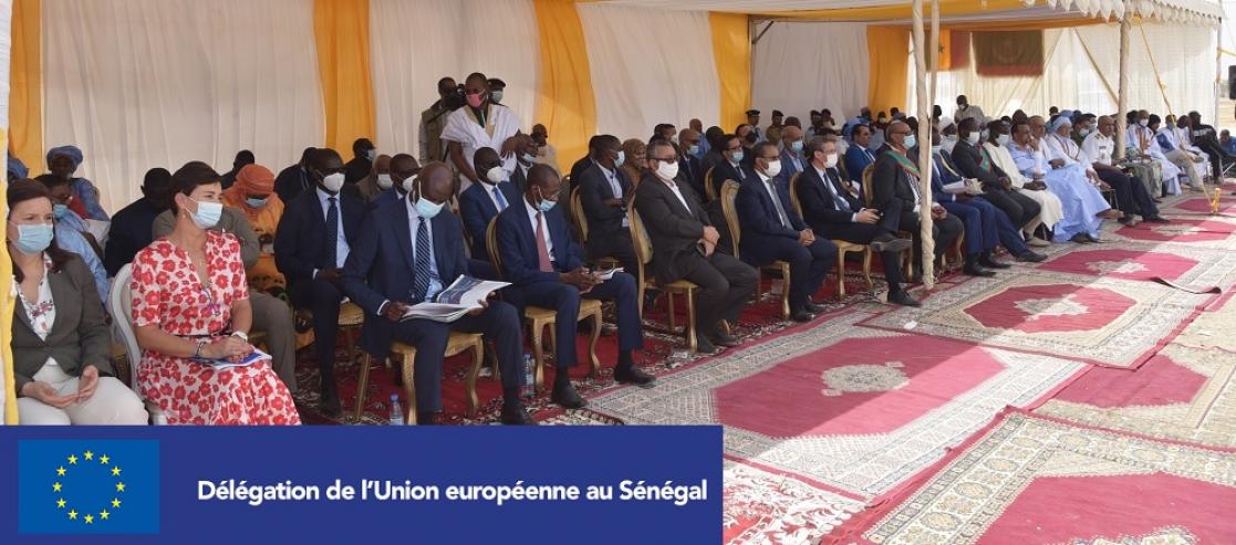 Group of people sitting down in a conference