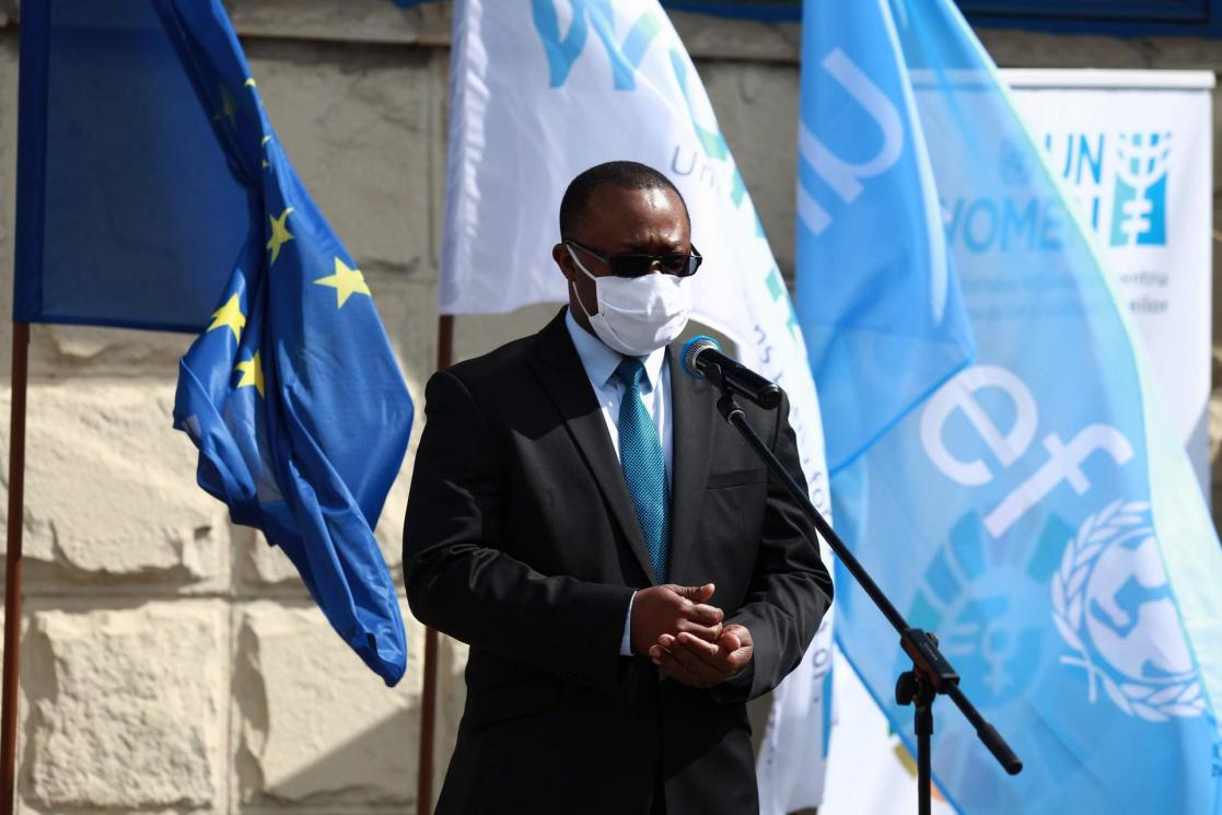 Man talking into a microphone