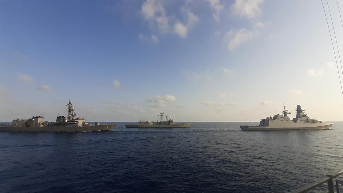 Three ships at sea