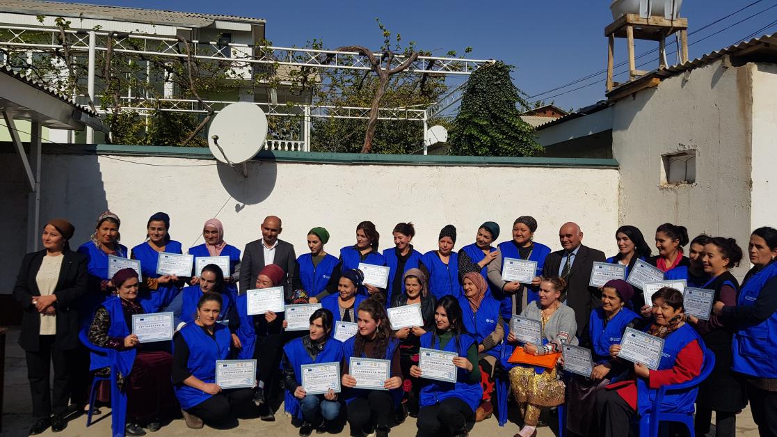 Group of women holding diplomas