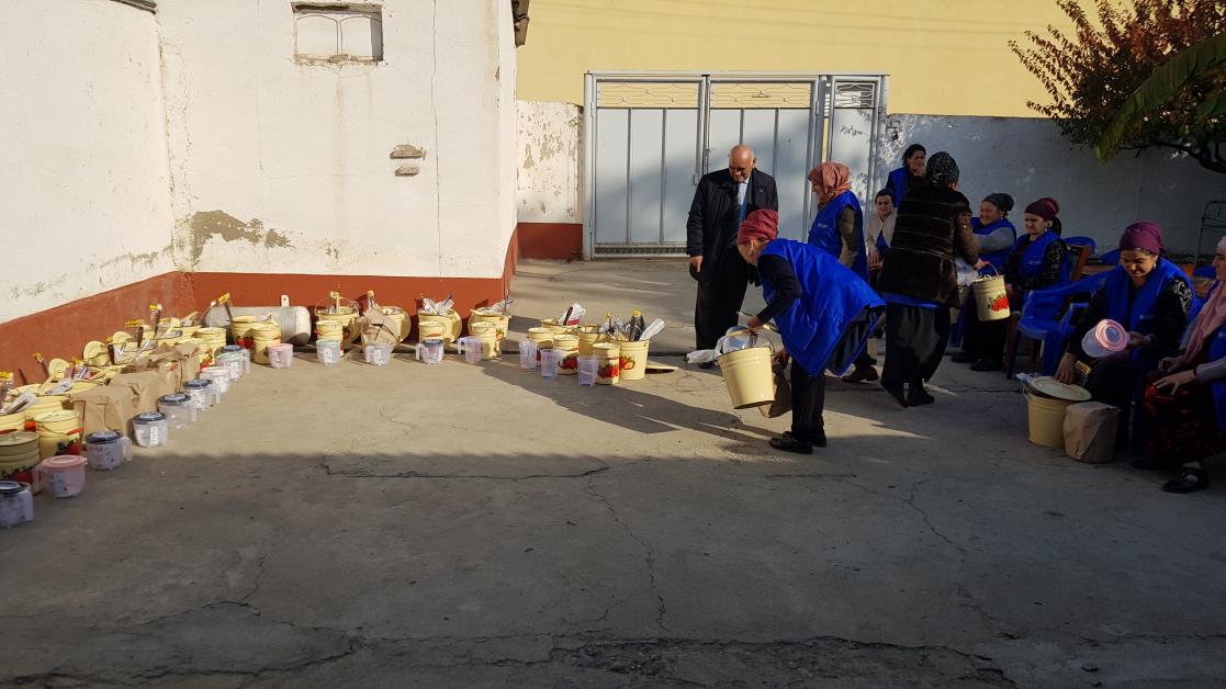 Woman holding buckets
