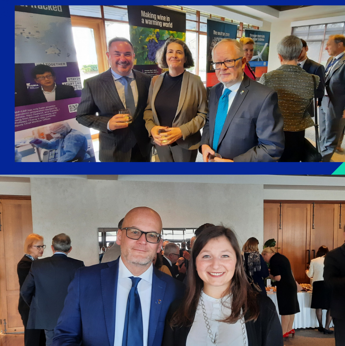 People in a event posing for a photo 