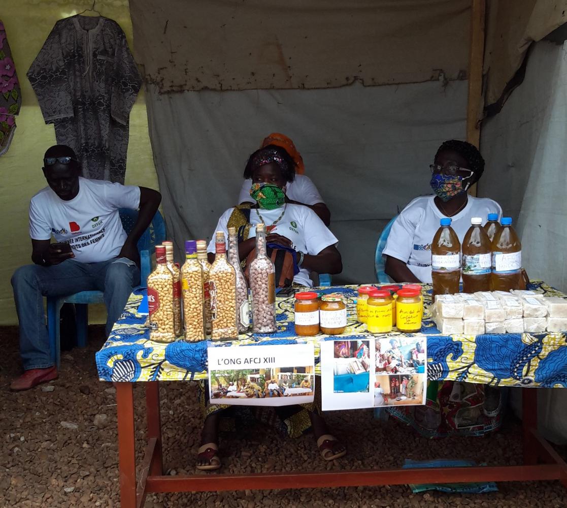 People at a market stall