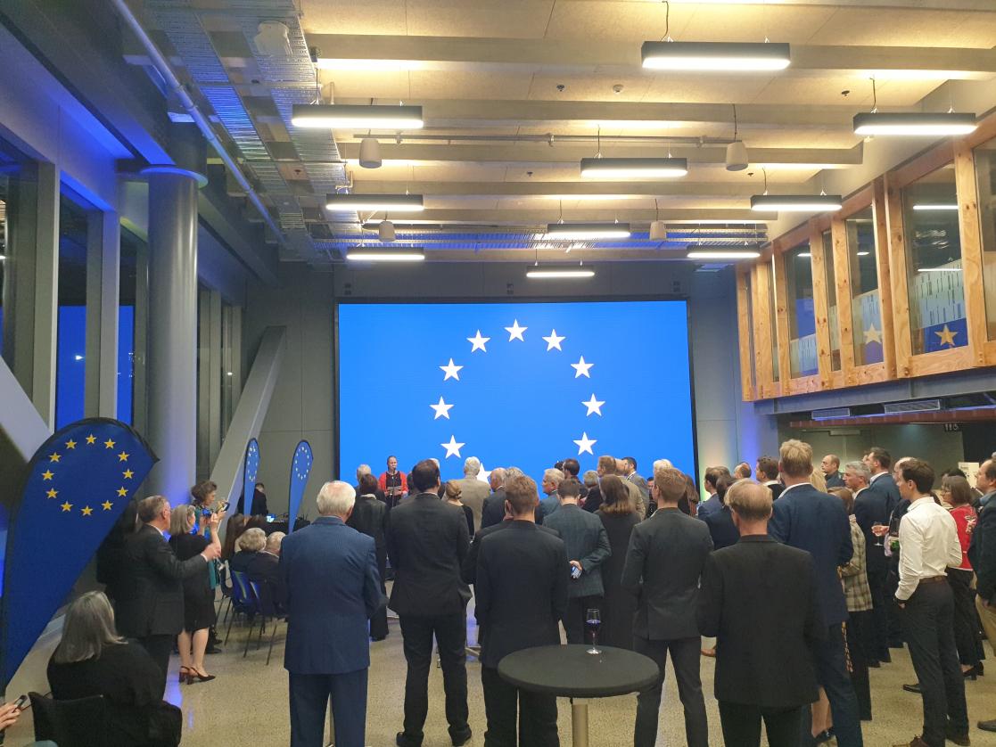 Audience attending a meeting