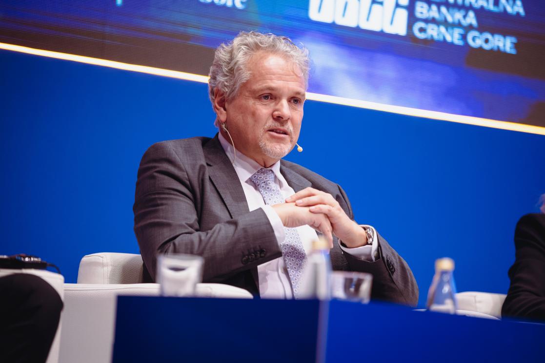 Ambassador Sattler sitting