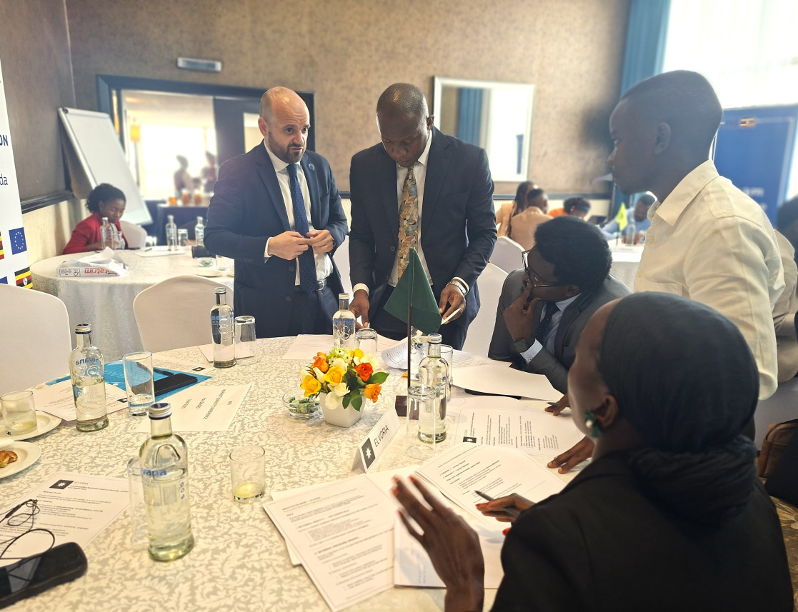 Deputy Ambassador Guillaume Chartrain engages delegates putting final touches to their declarations