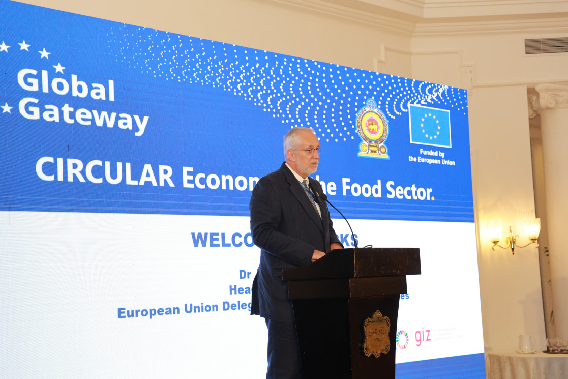 Johann Hesse addresses the audience from behind a podium