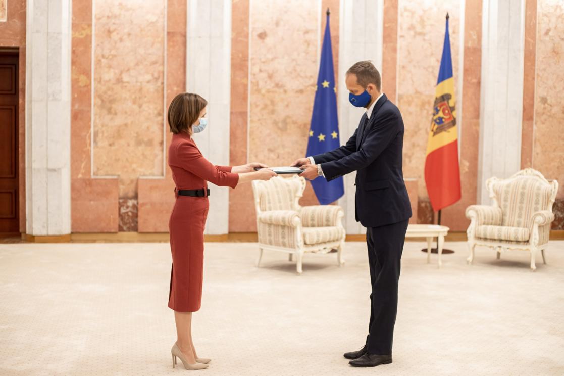 Two people greeting each other