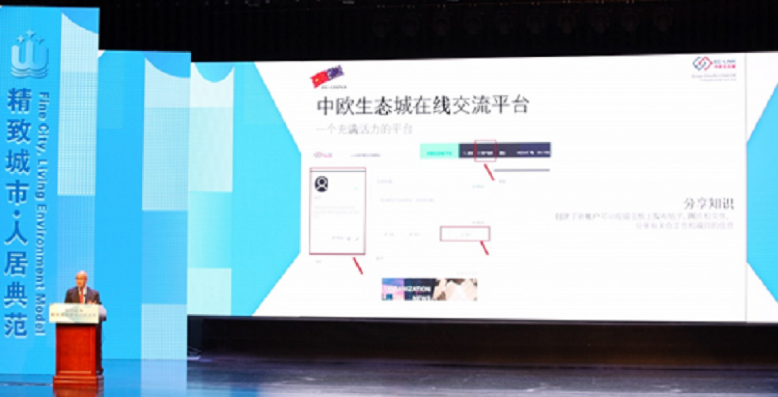 Man talking into a lectern during an event