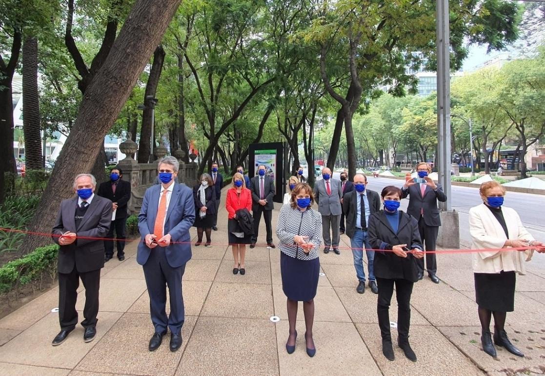 Several people cut an inaugural ribbon