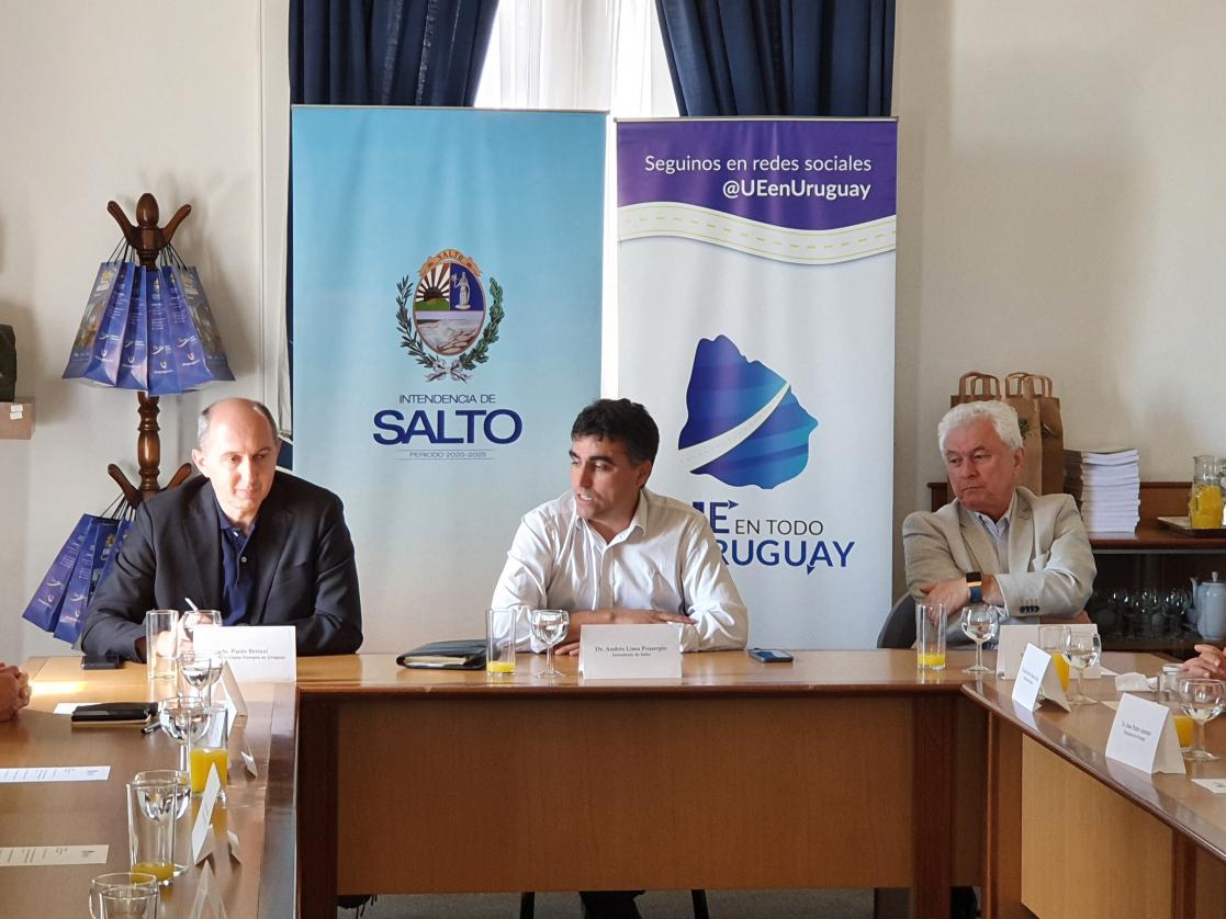 Three men during a roundtable