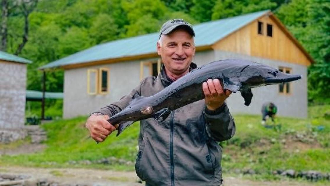 Man holding a fish