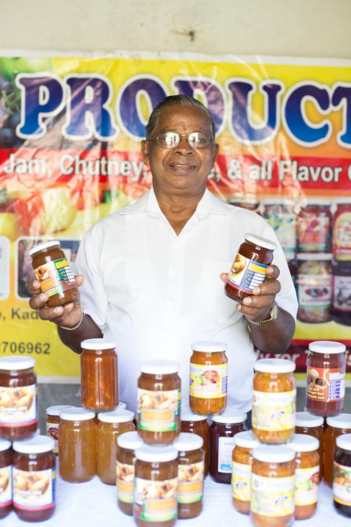 Man posing with canning jars