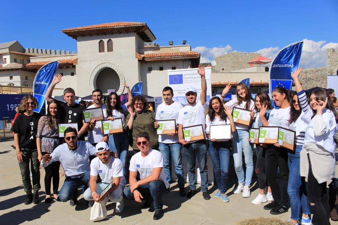 Group of people with diplomas