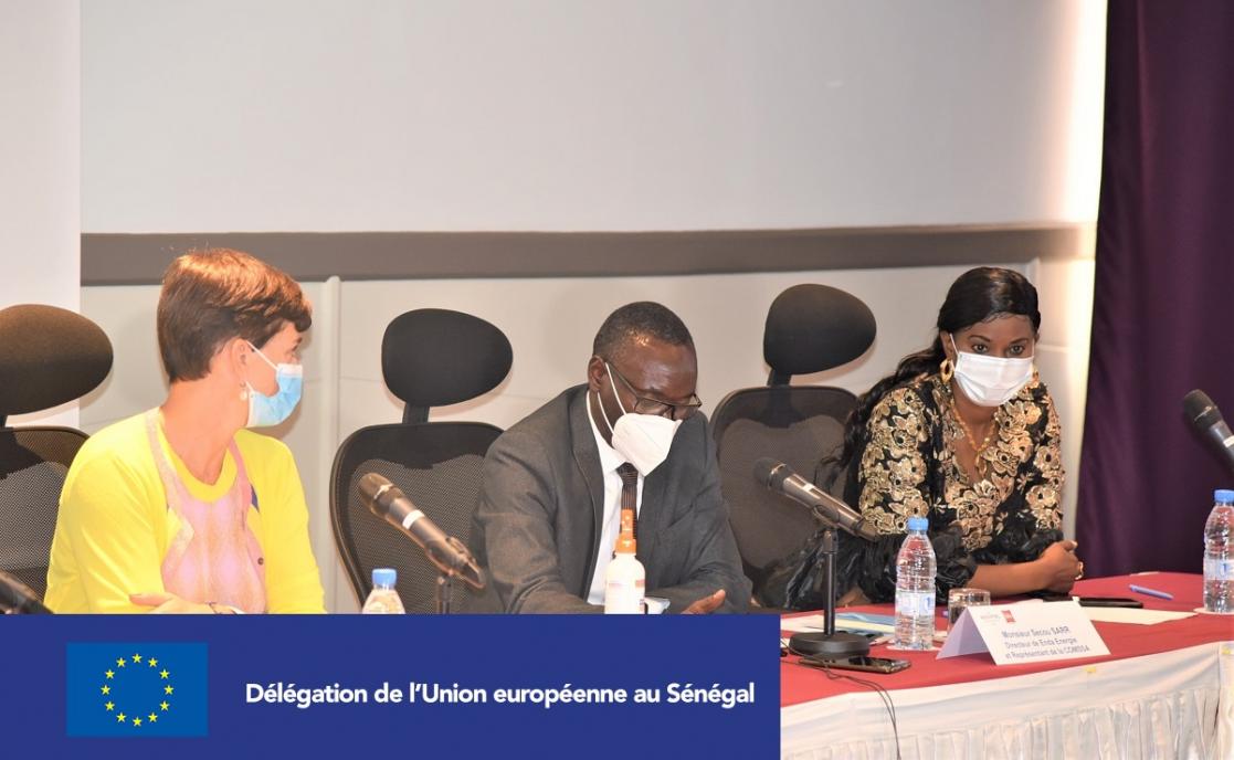 Three people during a meeting