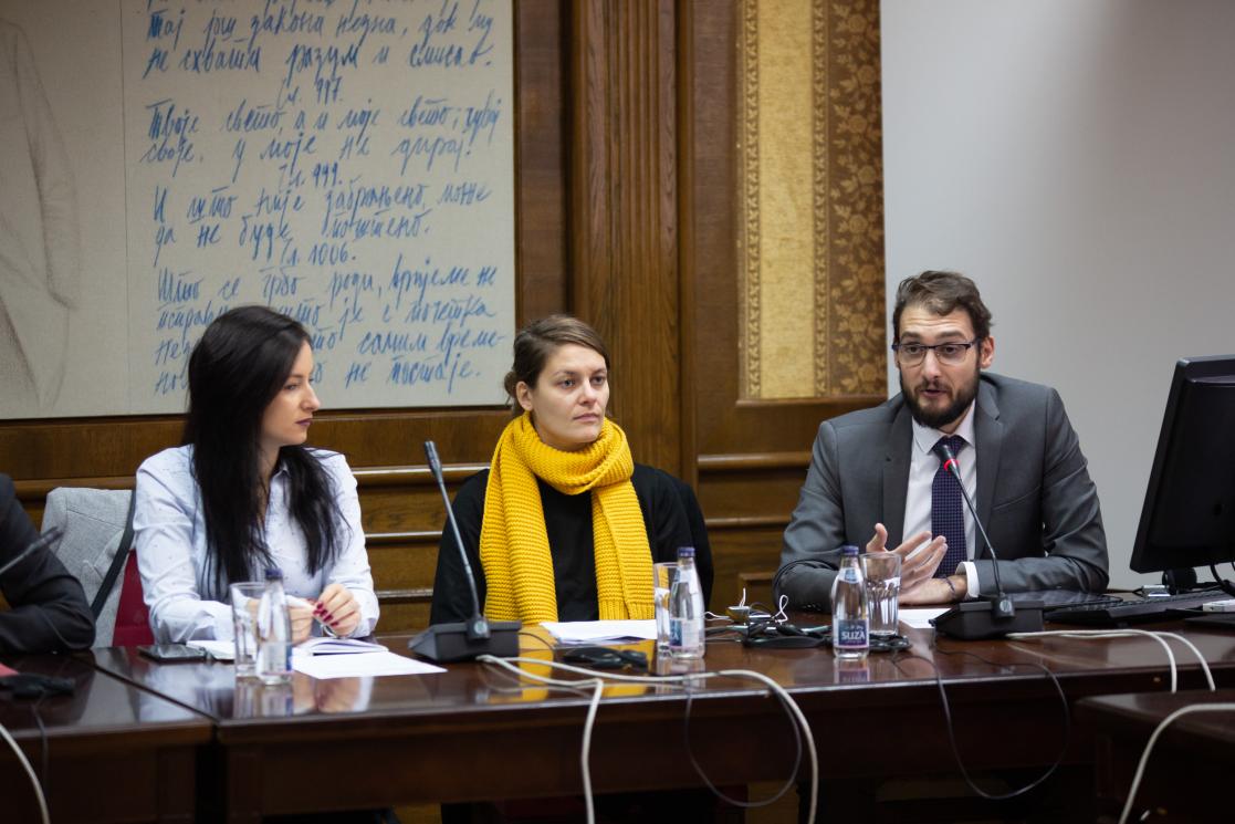 Two women and one man during an event