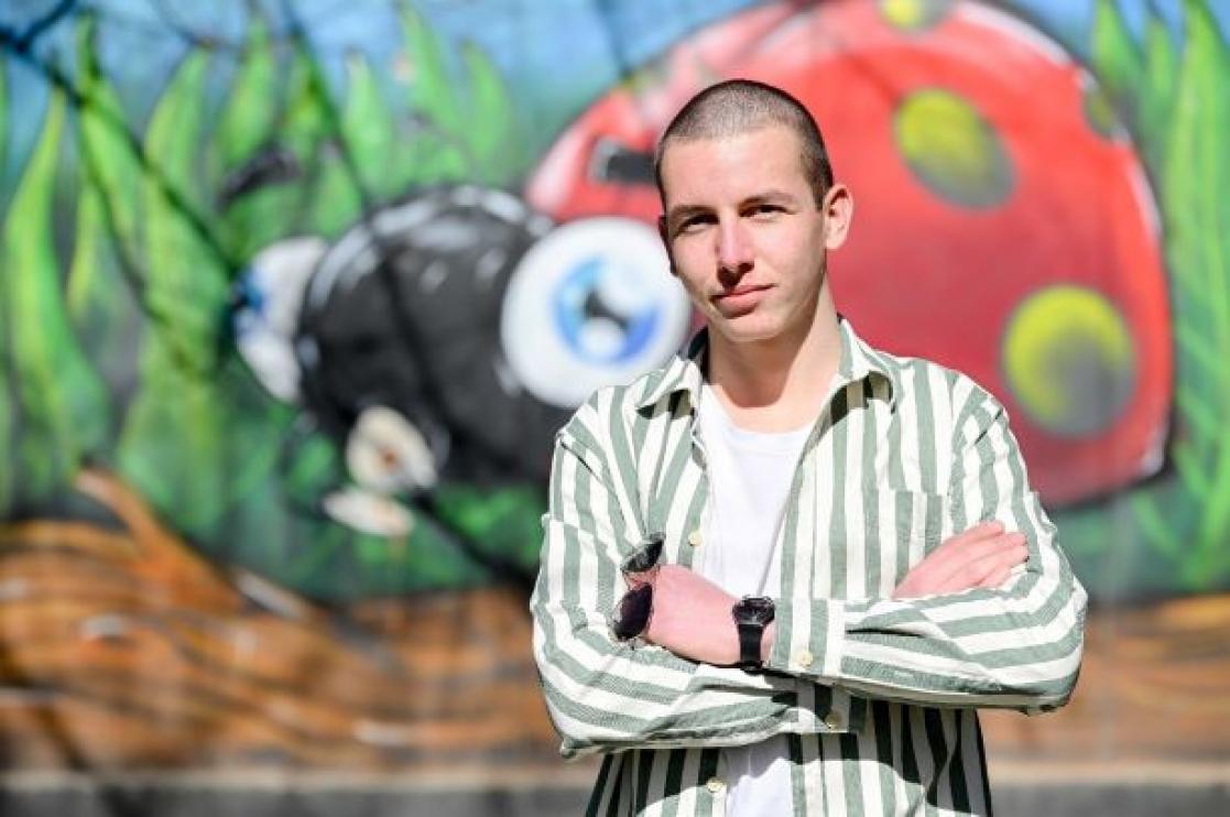 Young man posing in front of the camera
