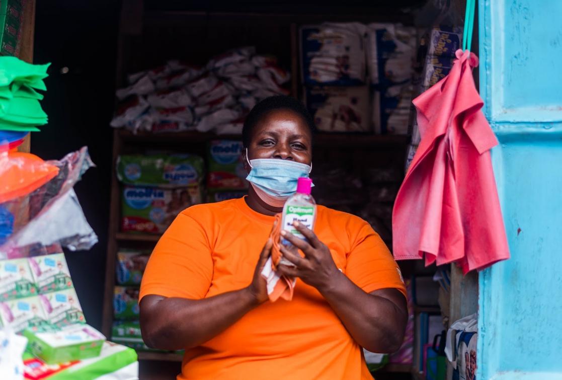 Woman with a bottle in her hands