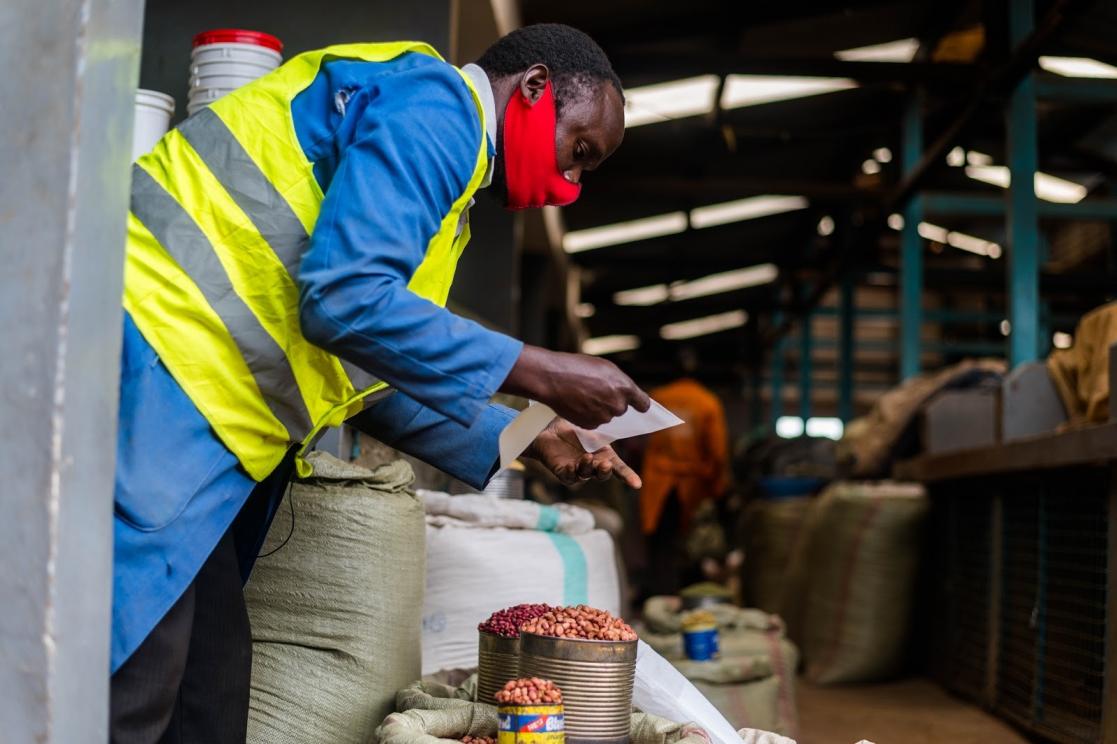 Man with a piece of paper in his hand