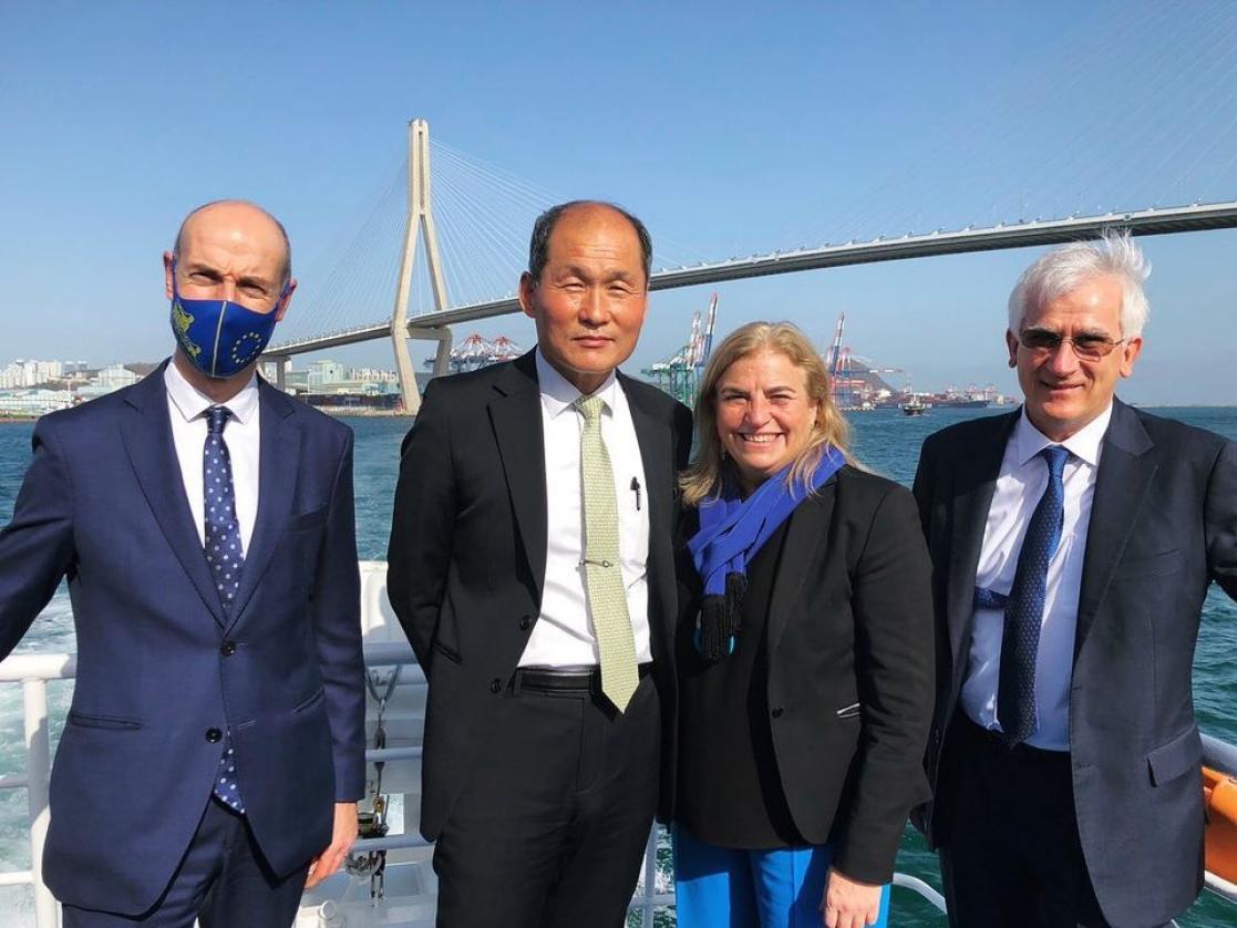 Four people photographed on a boat