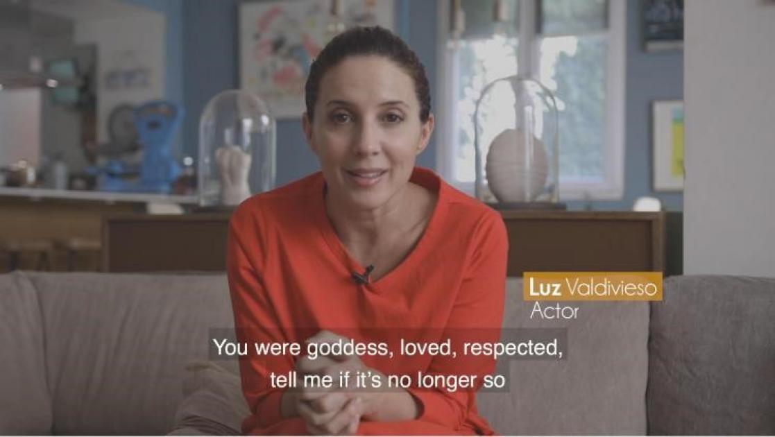 Woman talking in front of the camera