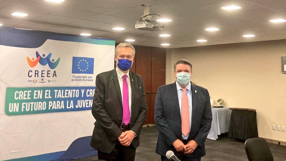 Two men in a conference