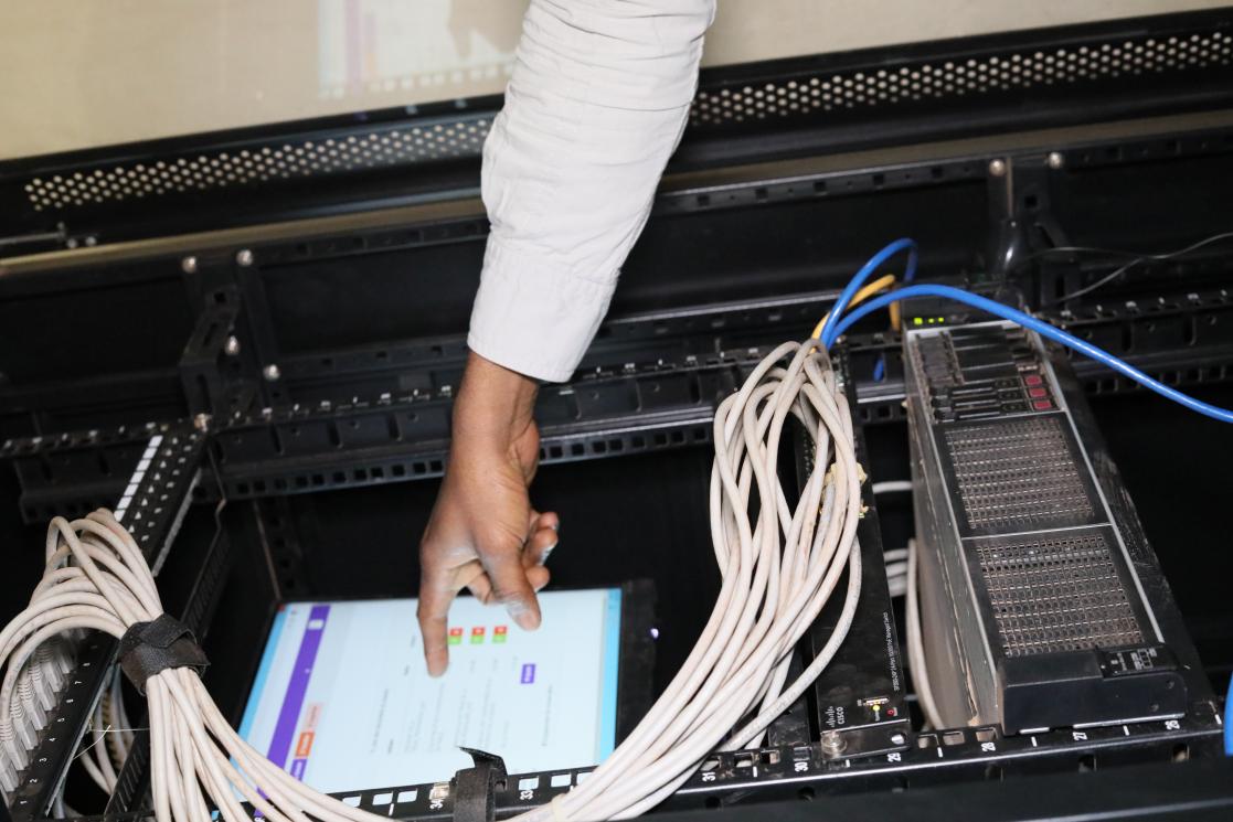 Hand touching screen