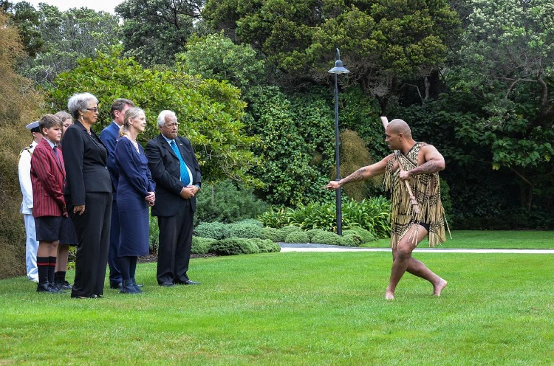 person dancing in front of a small audience