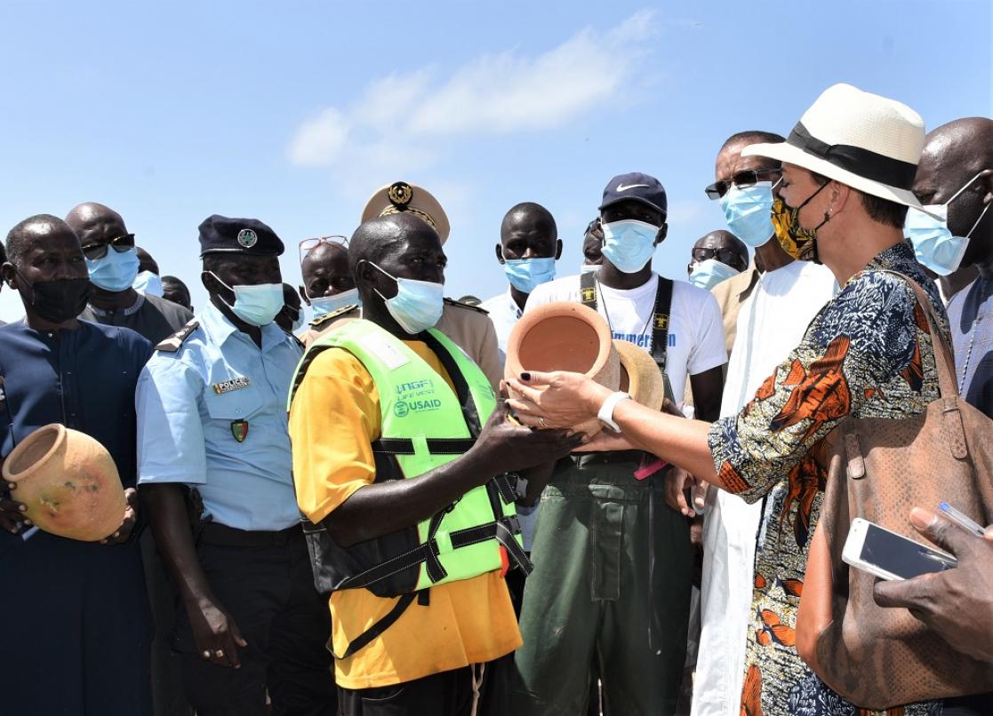 Group of people exchanging objects