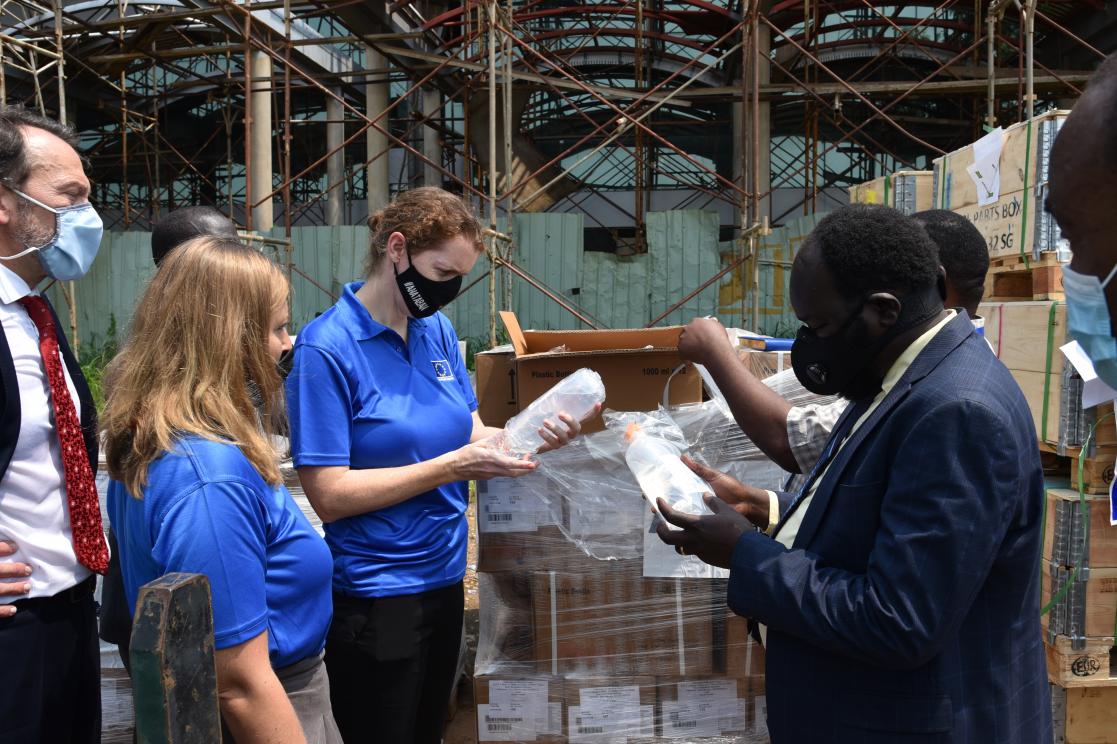 Group of people checking material
