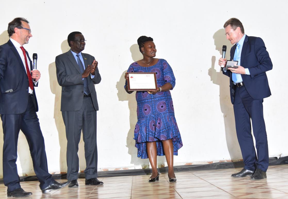 Woman posing with an award